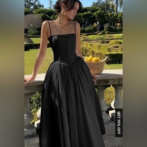 Beautiful black dress. Perfect for any night out.